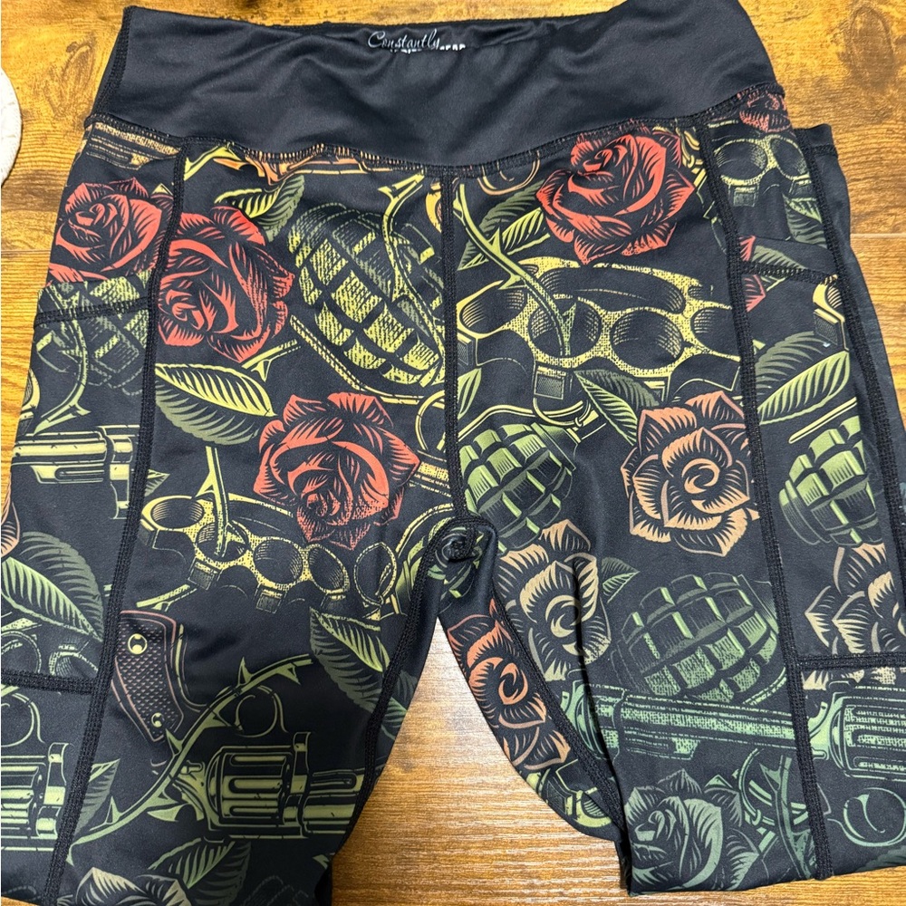 Constantly Varied Gear Black Leggings with Red and Green Floral Design